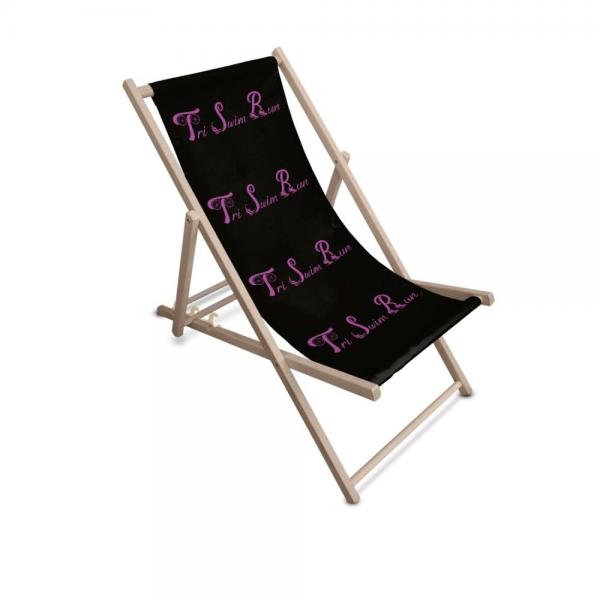 <p>Leżak plażowy z logo TRISWIMRUN</p>
